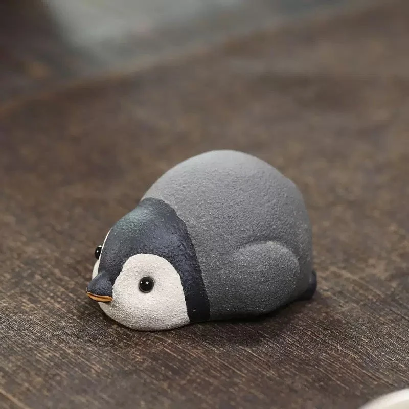 Kleine arktische Freunde – Handgefertigtes Teetier aus Ton