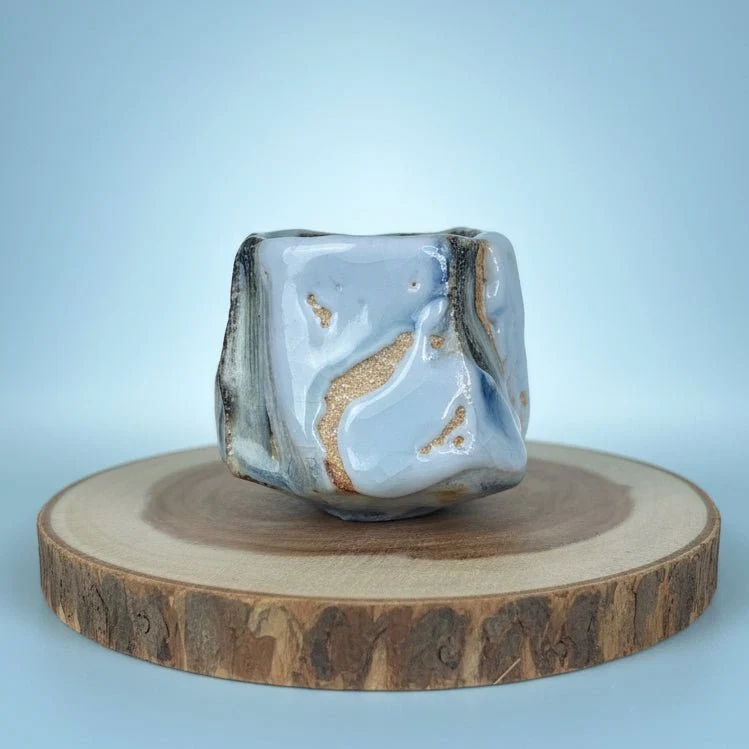Jingdezhen Holzgebrannte blau-weiße fließend glasierte Teetassen-Kollektion