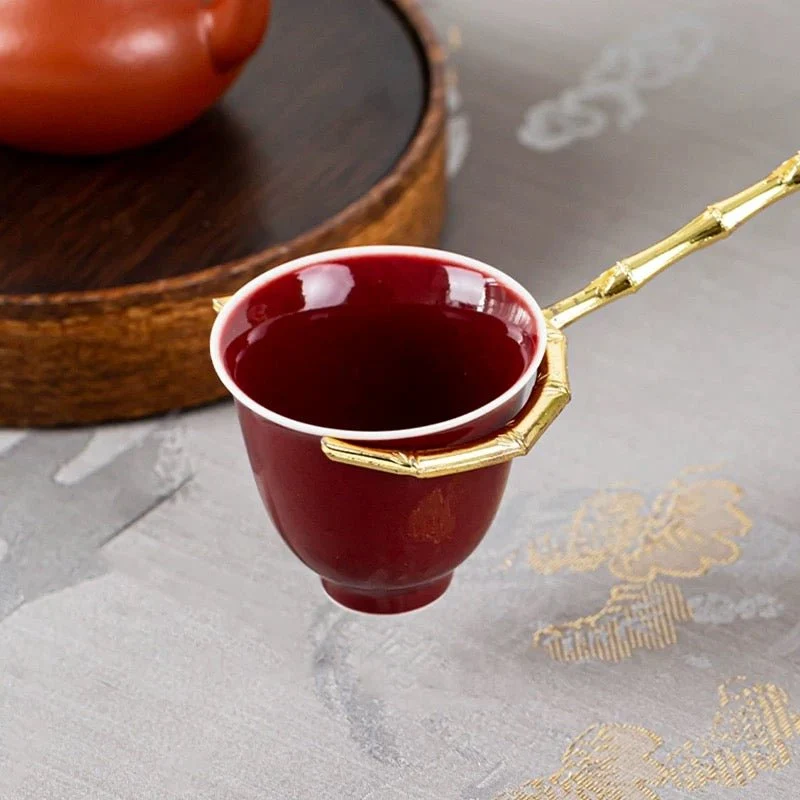 Teetassenhalter/Gabel aus goldenem Kupfer