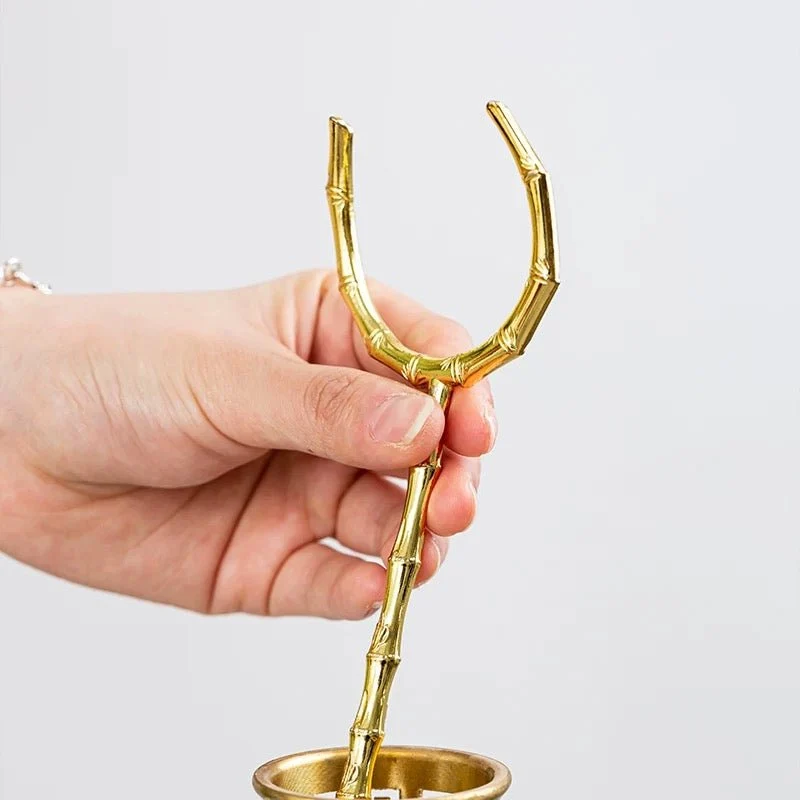 Teetassenhalter/Gabel aus goldenem Kupfer