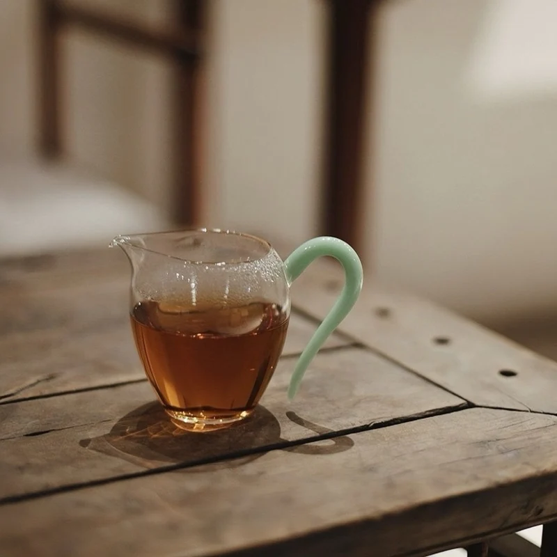 Fairness-Tasse (Teekanne) aus Pinguinglas