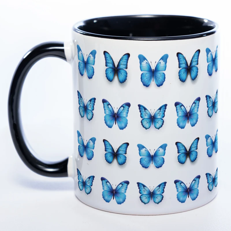 Spülmaschinenfeste Tasse mit vielen blauen Schmetterlingen - Kaffeetasse