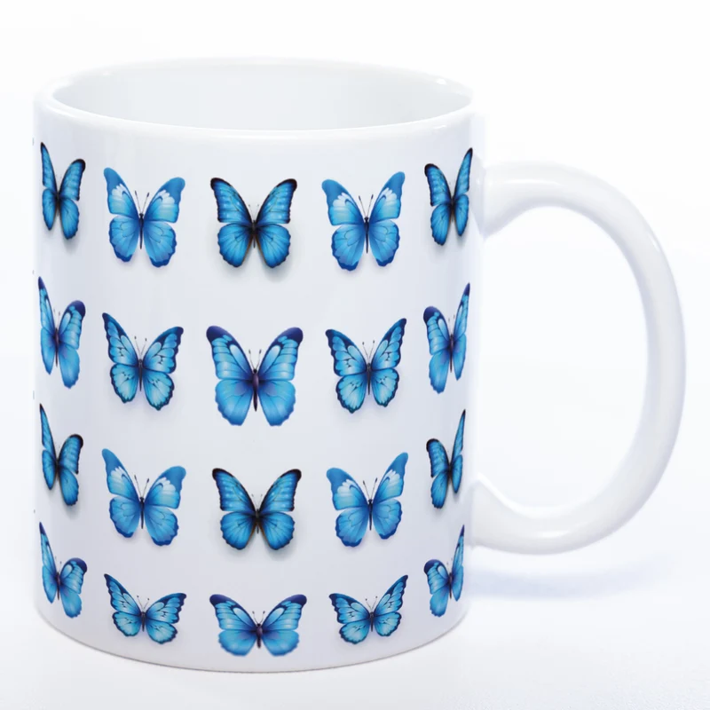 Spülmaschinenfeste Tasse mit vielen blauen Schmetterlingen - Kaffeetasse