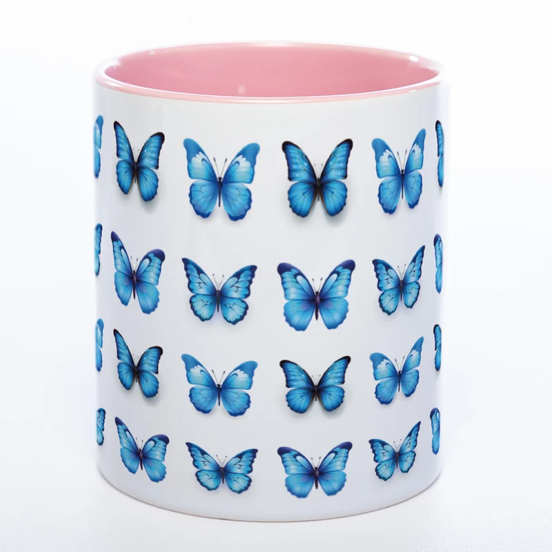 Spülmaschinenfeste Tasse mit vielen blauen Schmetterlingen - Kaffeetasse