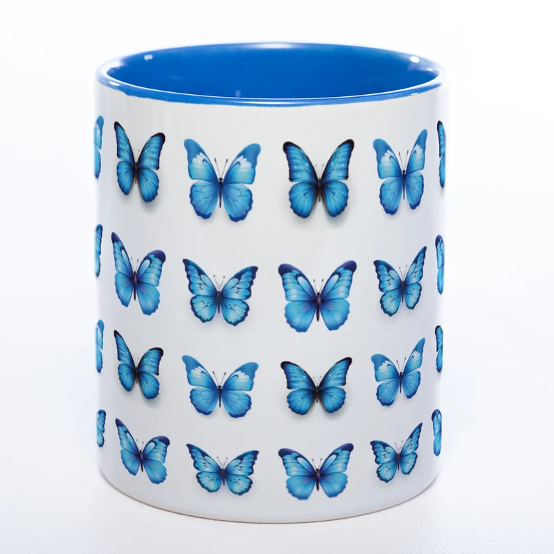 Spülmaschinenfeste Tasse mit vielen blauen Schmetterlingen - Kaffeetasse