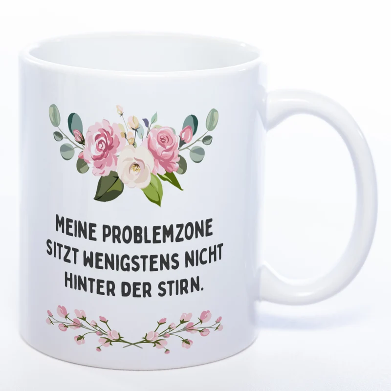 Blümchen-Tasse mit Spruch "Meine Problemzone sitzt wenigstens nicht hinter der Stirn." - Lustige Kaffeetasse spülmaschinenfest