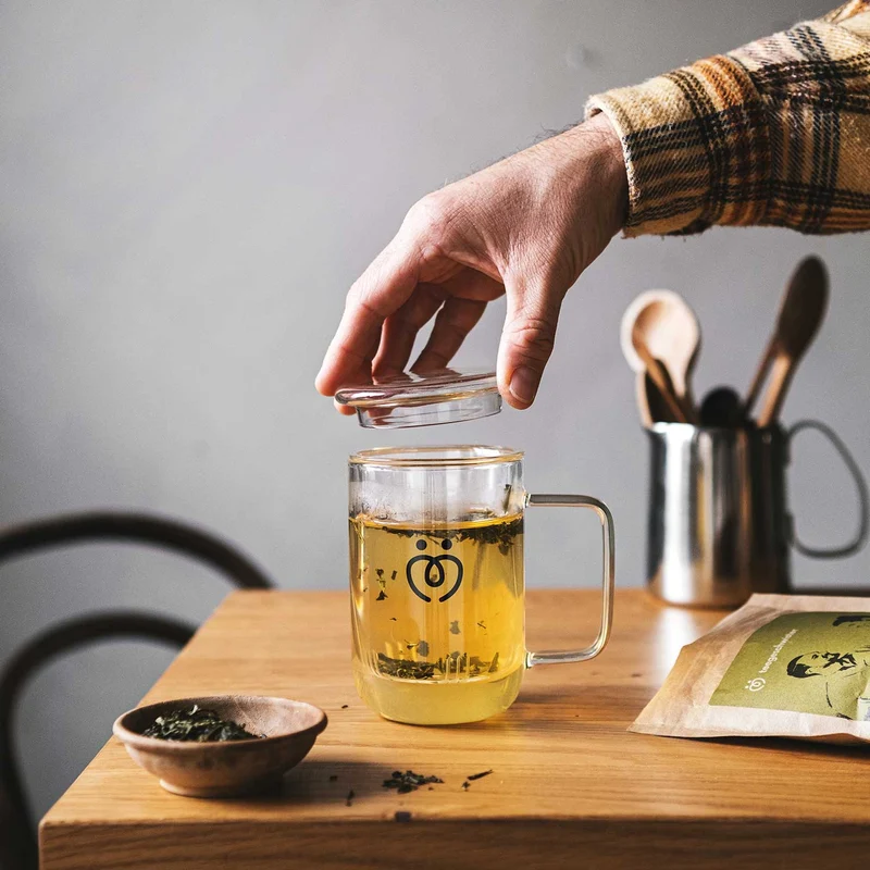 Teeglas mit Sieb