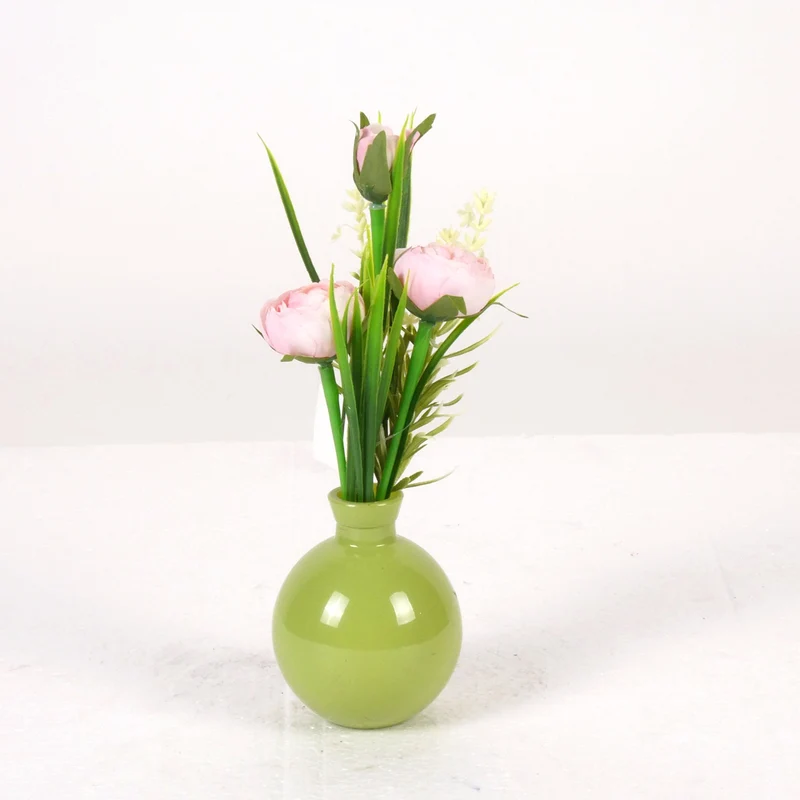 Ranunkel in grüner Glasvase H22cm pink