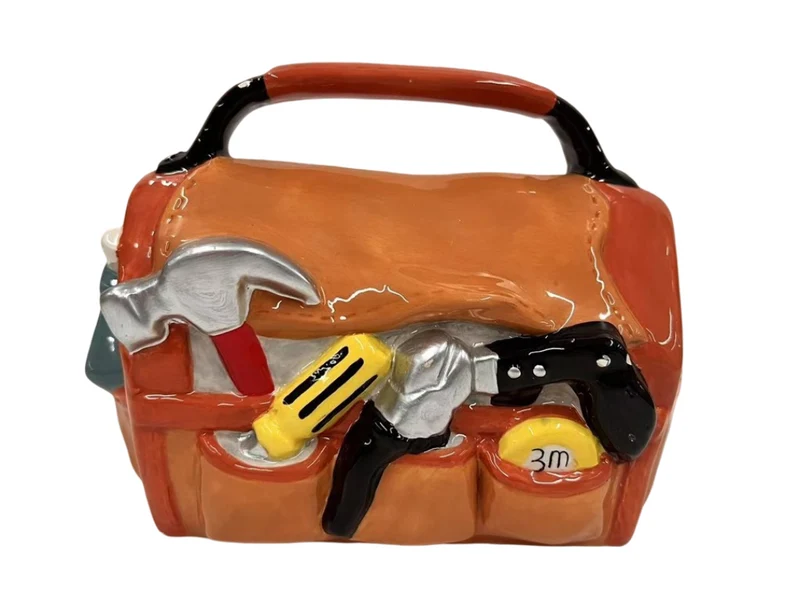 Spardose aus Keramik mit Arbeitstasche, orange, 18,3 x 10,8 x 13,7 cm