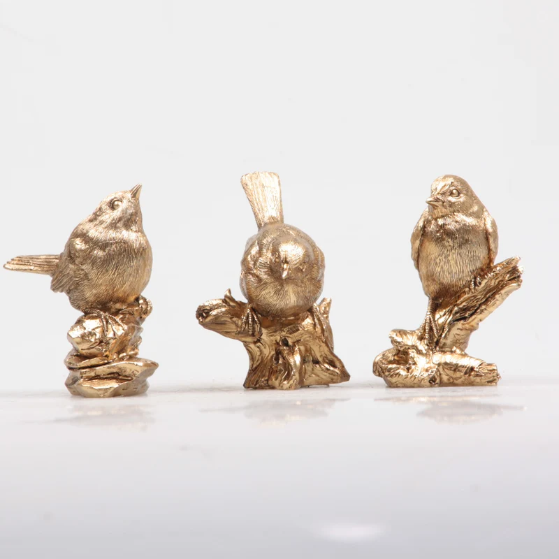VOGEL AUF STEIN/BAUMSTAMM 3 ASS 8,5X5X10 CM GOLD