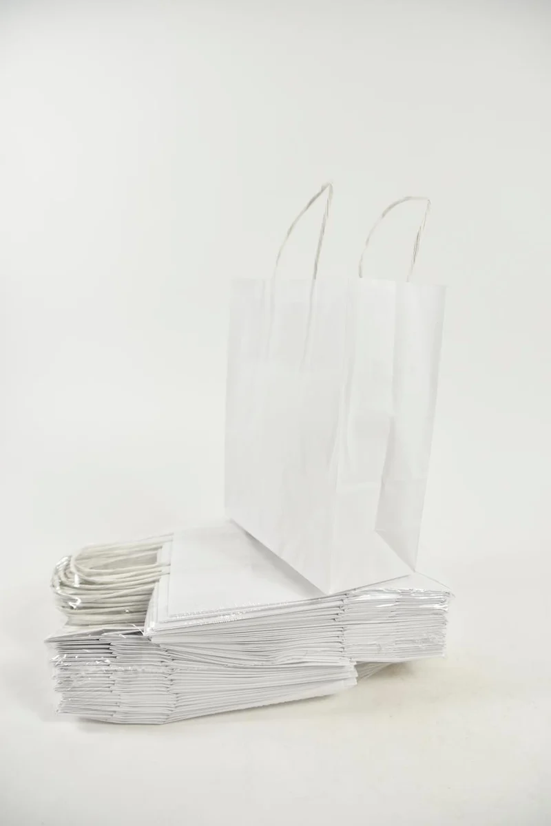 Tragetasche Weiß Kraft 18 + 8x22 cm zu 50 Stück gedrehtes Handgriff